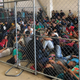 In this photo provided by the DHS Office of Inspector General, families sit in overcrowded cages at U.S. Border Patrol McAllen Station on June 10, 2019 in McAllen, Texas.